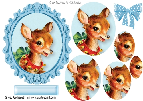 lovely reindeer with spotty bow oval pyramids in ornate frame