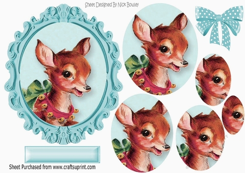 lovely reindeer with spotty bow oval pyramids in turq ornate frame