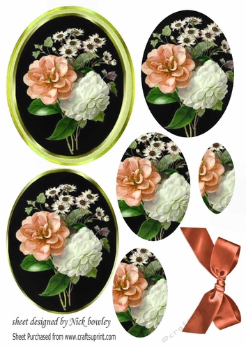 Pretty peach and white wild roses with bow oval pyramids
