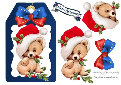 Cute little teddy bear in santa hat with bow (blue) on a tag