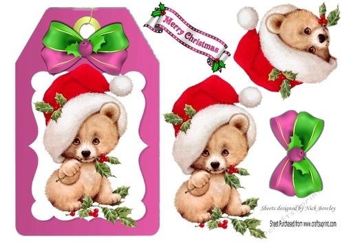Cute little teddy bear in santa hat with bow (pink) on a tag