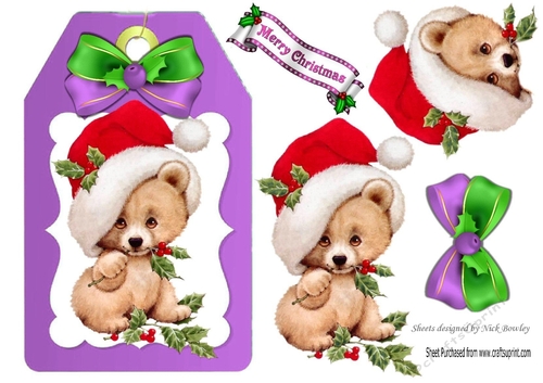 Cute little teddy bear in santa hat with bow (purple) on a tag
