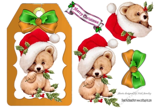 Cute little teddy bear in santa hat with bow (gold) on a tag