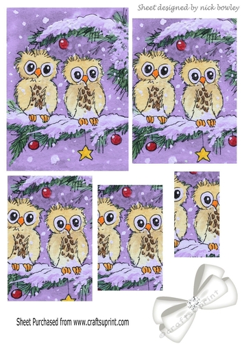 cute pair of owls on a branch with snow & bow (purple) pyramids