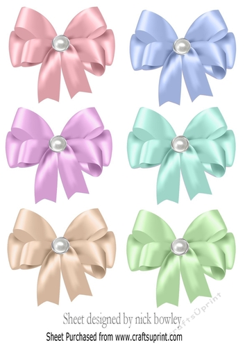 6 pretty pastel bows with pearl centres