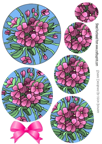 A pretty Kaleidoscope of pink painted flowers circle pyramids