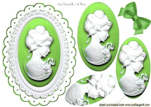 pretty white cameo with lime green frame & oval pyramids