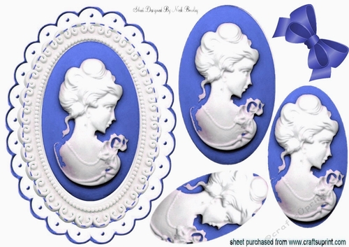 pretty white cameo with porcelain blue frame & oval pyramids