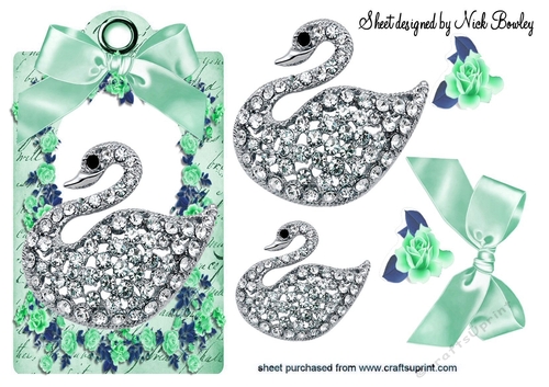 pretty diamond swan with turq roses & bow on a tag