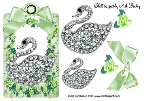 pretty diamond swan with green roses & bow on a tag