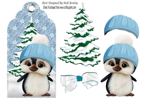 Cute little penguin in blue in snow scene tag with bow