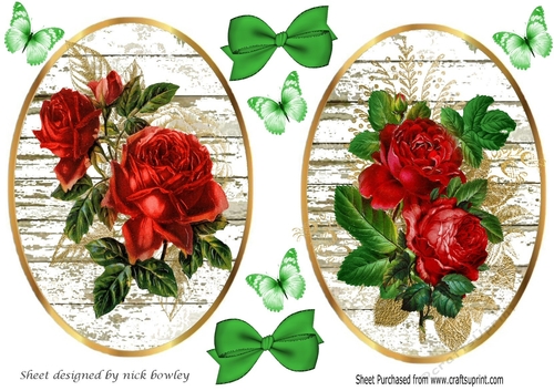 Two Pretty red roses on white washed wood oval toppers
