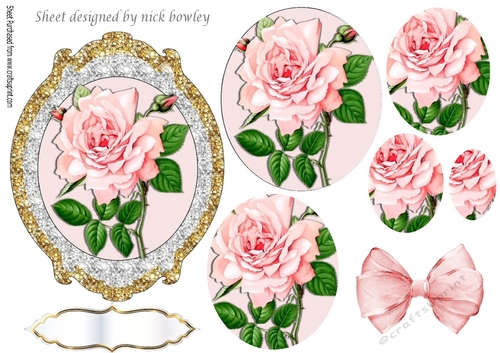 Pretty pink rose with buds in sparkle frame with pyramids