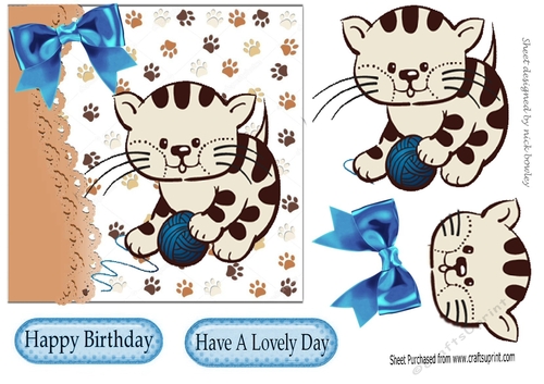 cute kitten playing with ball of wool with blue bow 7x7