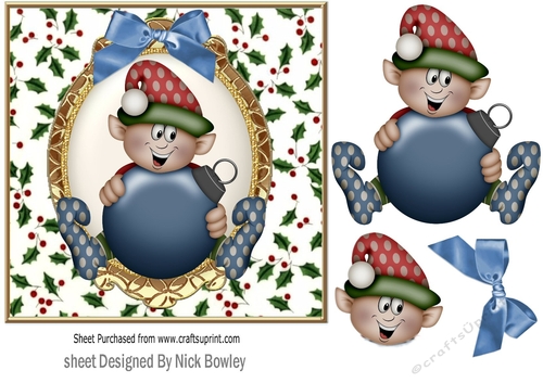  elf holding blue bauble in holly frame with bow 7x7