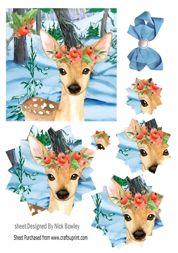 Lovely reindeer in the snow, with snowflake pyramids