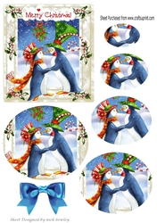 Whimsical kissing penguins in holly/berry oval pyramids