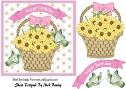 yellow daisies, with green butterflies in a basket 7x7