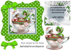 Cute christmas mice in a teacup, in green polkadot frame