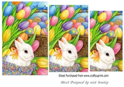 Cute white bunny with tulips pyramids