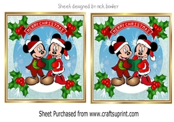 Lovely mickey mouse snow scene with holly toppers