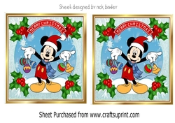 Lovely mickey mouse snow scene with baubles holly toppers (two)