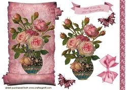 Vase of Roses on a Scroll