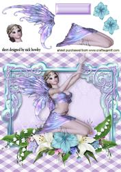Pretty Fairie Sitting Down with Flowers