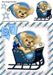 Cute Puppy in Blue in a Sleigh with Blue Bow