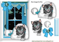 Kitten in Santa Hat in the Window