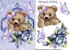 Cuddly Brown Teddy in Blue Rose Frame