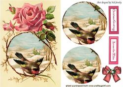 Pretty Bird with Rose in Snow Scene Oval Pyramids