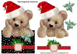 Little Fuzzy Bear in Santa Hat with Bow Over the Edge