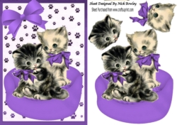 Cute vintage kittens in purple basket with bow