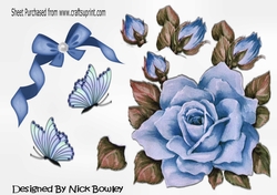 pretty painted big blue rose, with  bow and butterflies