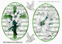 two lovely sympathy toppers of a green cross, white lillies, & doves