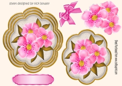 pretty pink flowers on a ornate topper with corner bows