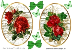 Two Pretty red roses on white washed wood oval toppers