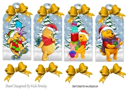 Four lovely christmas tags with pooh bear in the snow with gold bows
