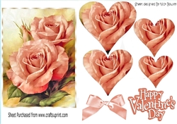 pretty peach roses with heart pyramids