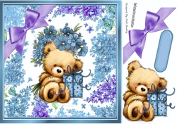 Cute teddy with gift and blue flowers in flower 8x8 frame