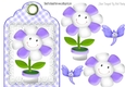 Cute toony face flower on lace purple tag/topper