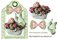Pretty vintage roses with butterfly and bow on a tag