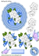 Pretty blue lace doillie with white flowers cut out
