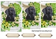 Lovely black labrador on a scroll with green roses pyramids