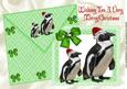 Penguins in Santa Hats on a Green Card and Envelope A4