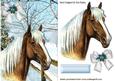 Palamino Horse in a Field of Snow Covered Trees