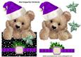 Little Fuzzy Bear in Purple Santa Hat with Bow Over the Edge