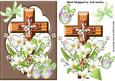 Easter Cross with White Lillies and Chocolate Eggs