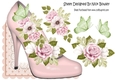 pink shoe with painted roses over the edge with butterflies